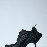 Close-up of Balenciaga pumps hardware and fine stitching