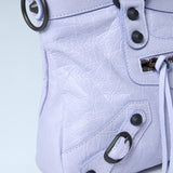 Close-up of Balenciaga shoulder bags hardware and fine stitching