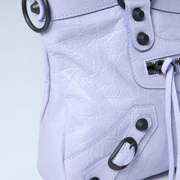 Close-up of Balenciaga shoulder bags hardware and fine stitching