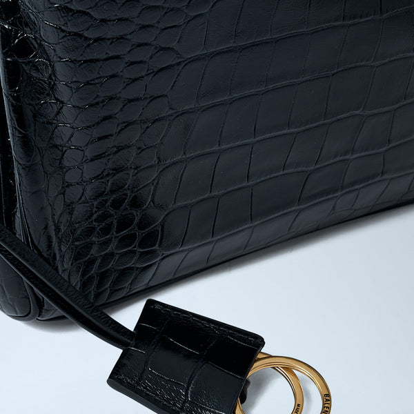 Close-up of Balenciaga shoulder bags hardware and fine stitching
