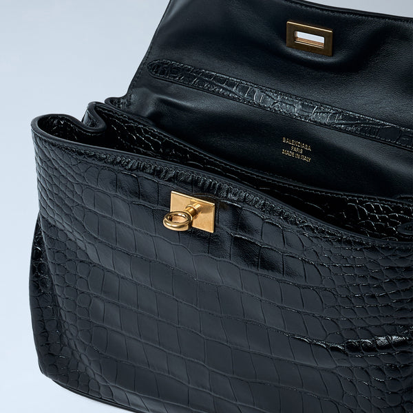 Balenciaga shoulder bags lifestyle shot premium designer piece