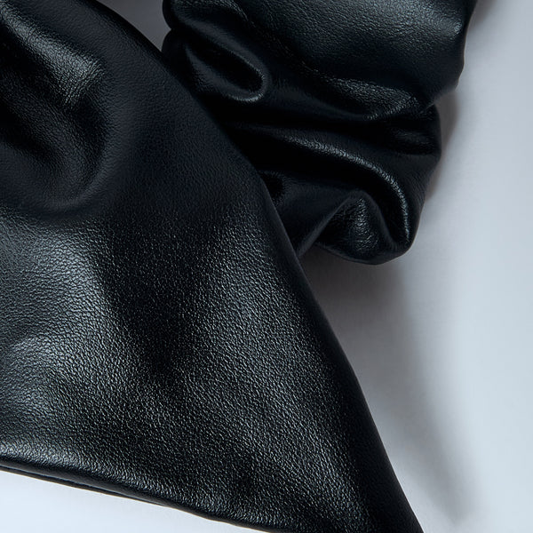 Close-up of Balenciaga miscellaneous hardware and fine stitching