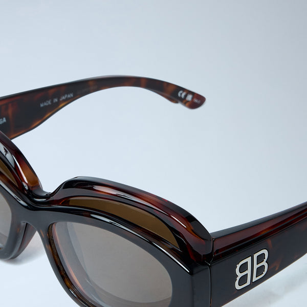 Close-up of Balenciaga sunglasses hardware and fine stitching