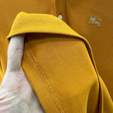 Close-up of Burberry designer clothing craftsmanship