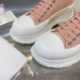 Alexander McQueen shoes Style 304 - close-up of statement logo accent