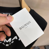 Side profile view of Balmain luxury piece style No.038