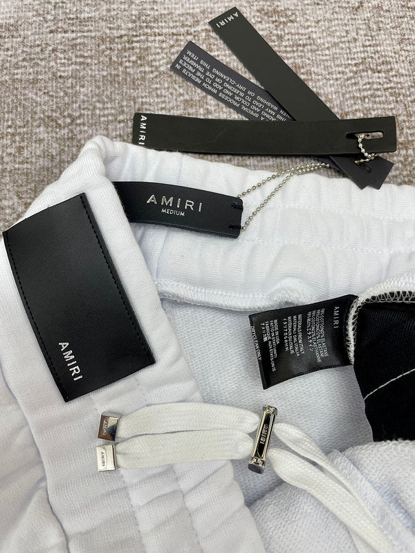Three-quarter angle view of Amiri luxury piece style No.047