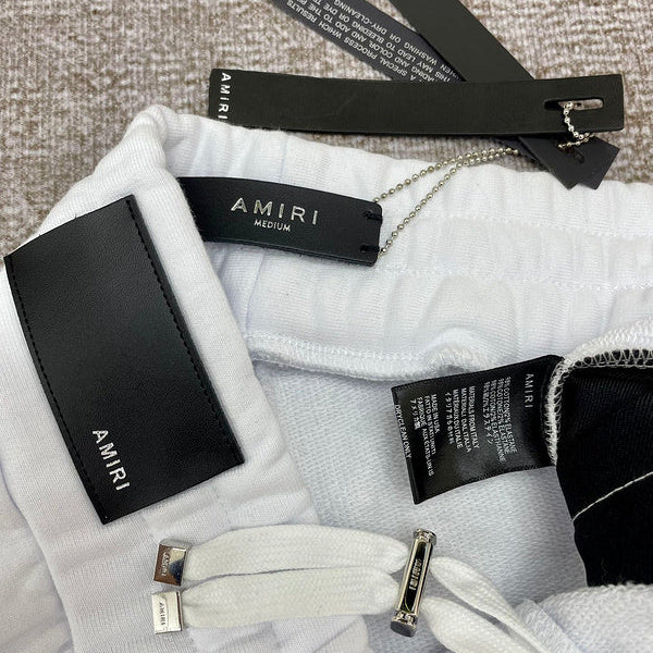 Three-quarter angle view of Amiri luxury piece style No.047