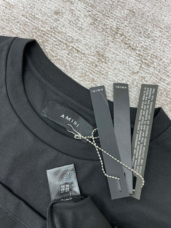 Three-quarter angle view of Amiri luxury piece style No.205