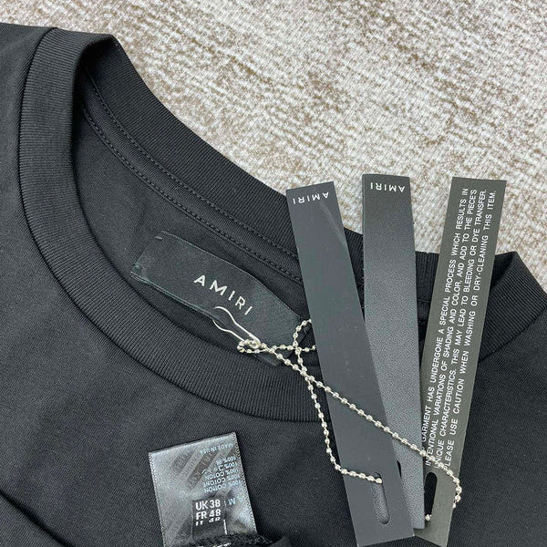 Three-quarter angle view of Amiri luxury piece style No.205