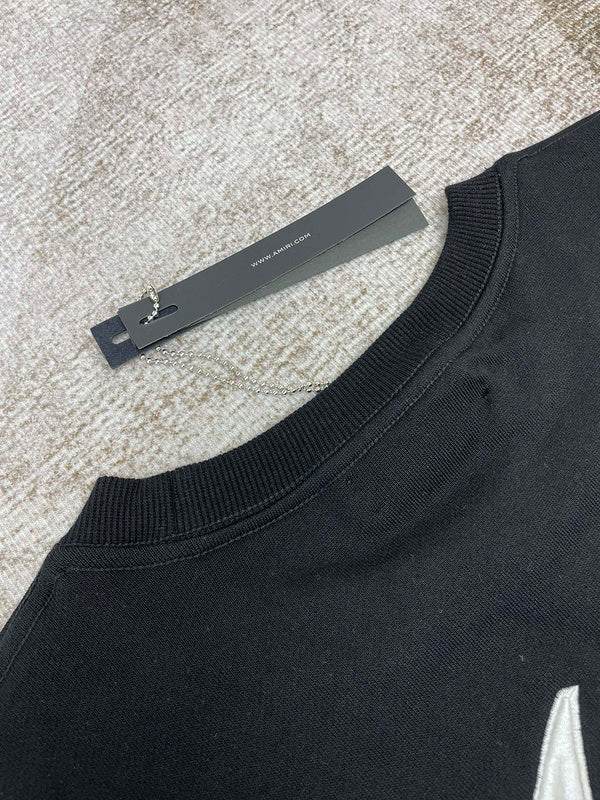 Side profile view of Amiri luxury piece style No.010