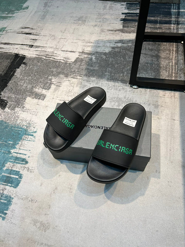 Balenciaga Black Flat Thong Sandals - Close-Up Texture View