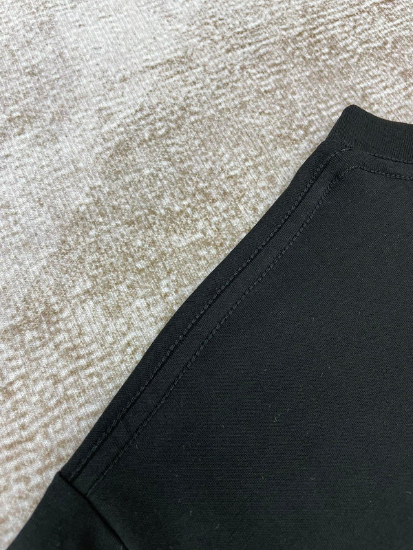 Side profile view of Amiri luxury piece style No.209