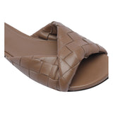 Close-up of Bottega Veneta sandals hardware and fine stitching