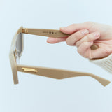 Bottega Veneta sunglasses lifestyle shot premium designer piece