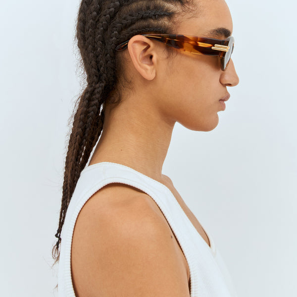 Bottega Veneta premium sunglasses detail and craftsmanship close-up