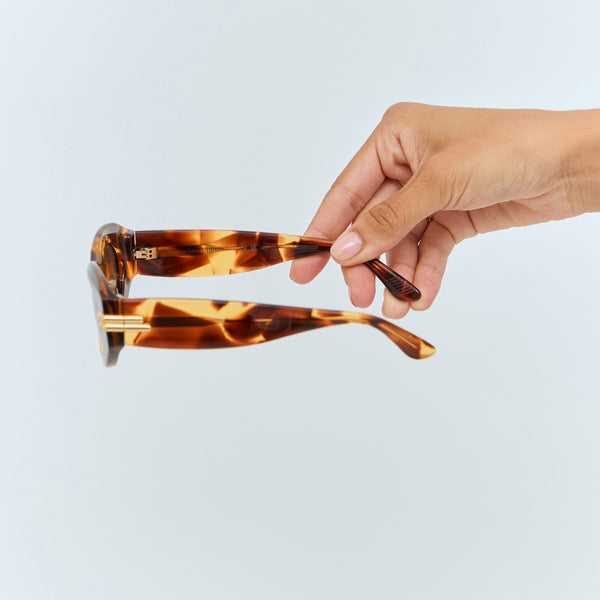 Bottega Veneta sunglasses lifestyle shot premium designer piece