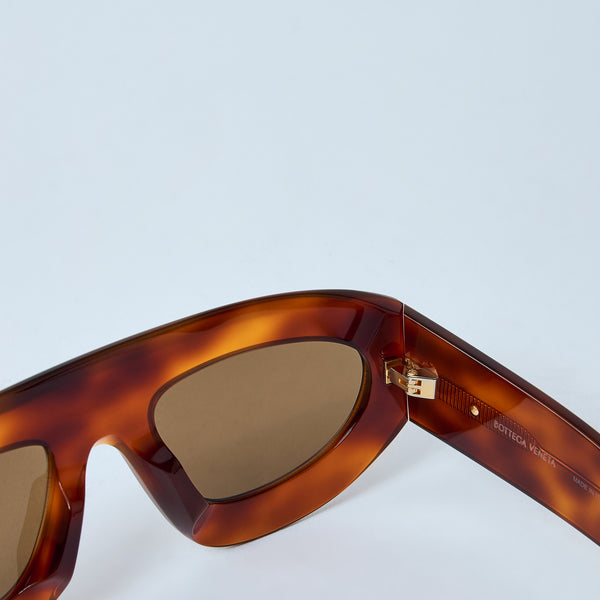 Bottega Veneta sunglasses lifestyle shot premium designer piece