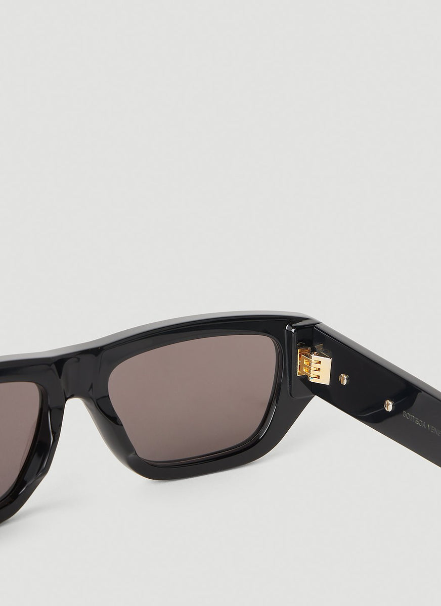 Close-up of Bottega Veneta sunglasses hardware and fine stitching