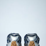 Close-up of Bottega Veneta flats hardware and fine stitching
