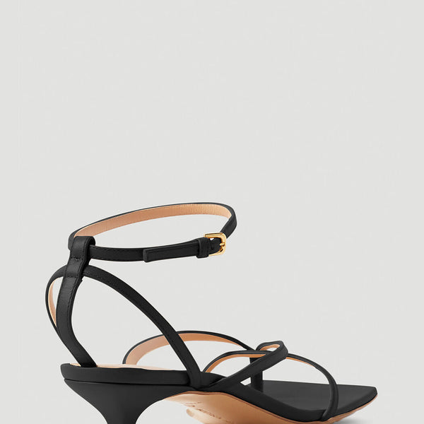 Close-up of Bottega Veneta sandals hardware and fine stitching