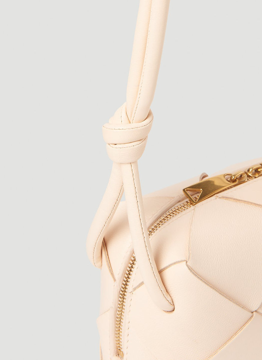 Close-up of Bottega Veneta shoulder bags hardware and fine stitching