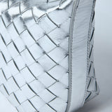Close-up of Bottega Veneta shoulder bags hardware and fine stitching