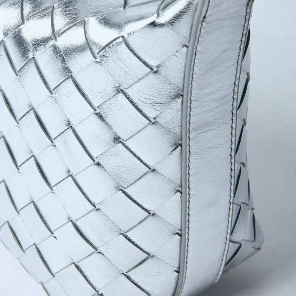 Close-up of Bottega Veneta shoulder bags hardware and fine stitching