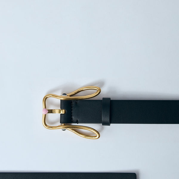 Close-up of Bottega Veneta belts hardware and fine stitching