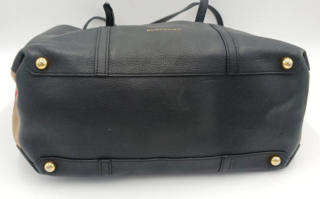 Close-up of Burberry diaper bags hardware and fine stitching