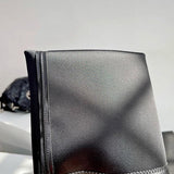 Side profile view of Saint Laurent luxury piece style No.018