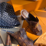 Side profile view of Louis Vuitton luxury piece style No.010