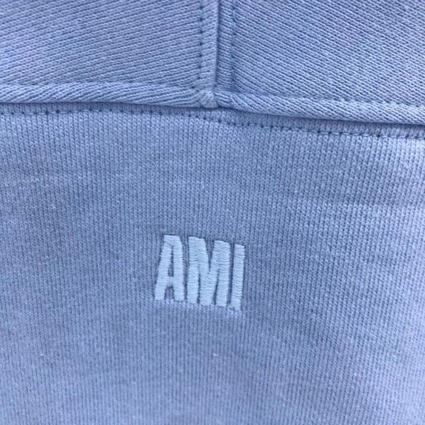 Three-quarter angle view of Amiri luxury piece style No.052