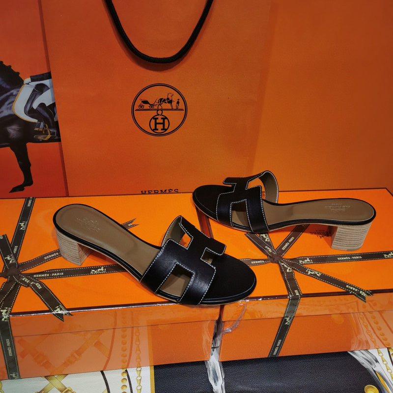 Hermès Black Ankle Strap Sandals - Sole Detail View