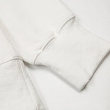 Three-quarter angle view of Amiri luxury piece style No.001
