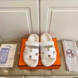 Hermes sandals Style 093 - front view, iconic logo design