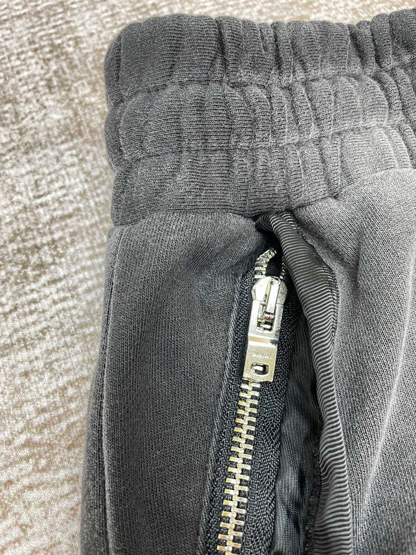 Three-quarter angle view of Amiri luxury piece style No.073