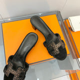 Hermès Black Ankle Strap Sandals - Heel Detail View