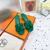 Hermes shoes Style 275 - close-up of statement logo accent