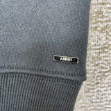 Front view of Amiri luxury piece style No.114