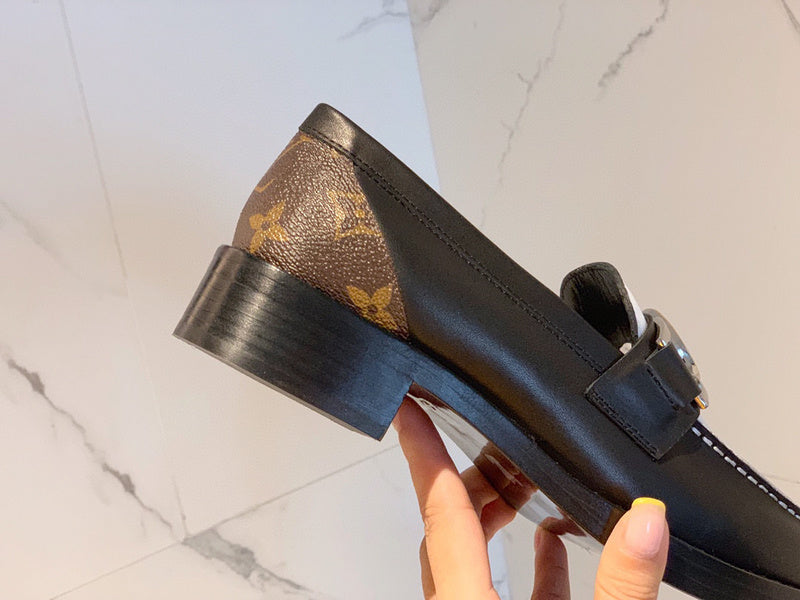 Close-up of Louis Vuitton shoes craftsmanship