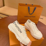 Louis Vuitton Black High-Top Sneakers - Angled View