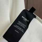 Side profile view of Balmain luxury piece style No.048