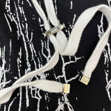 Three-quarter angle view of Amiri luxury piece style No.077