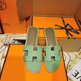 Hermes sandals Style 090 - close-up of sleek modern silhouette