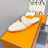 Hermès White Flat Thong Sandals - Lifestyle Styling Shot