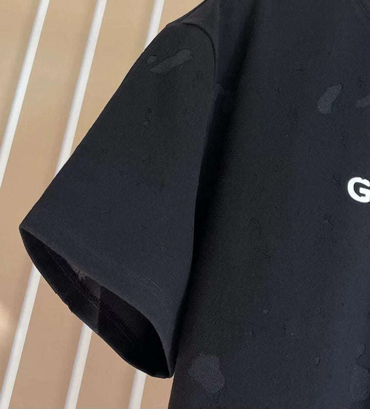 Texture and finish detail of Givenchy luxury piece style No.223