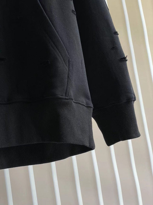 Texture and finish detail of Givenchy luxury piece style No.129