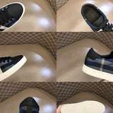 Burberry Black High-Top Sneakers - Side Profile View