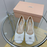 Side profile view of Miu Miu luxury piece style No.107